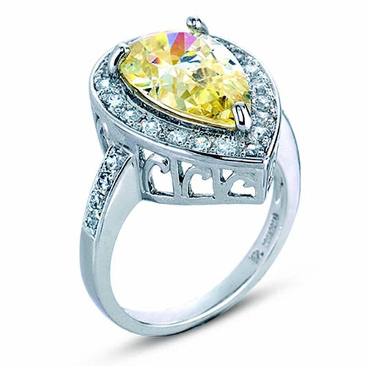 STERLING SILVER RING WITH YELLOW CENTER AND CLEAR CZ STONES